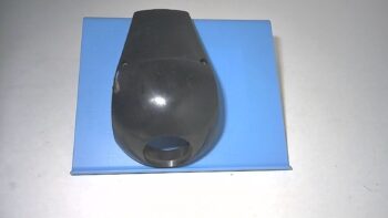 COPERCHIO POST. MASCHERINA PORTA FARO GRILLO PIAGGIO 9093005
