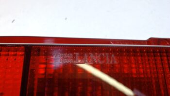 LENTE FARO POSTERIORE SX LANCIA Y10 ORIGINALE 7718343