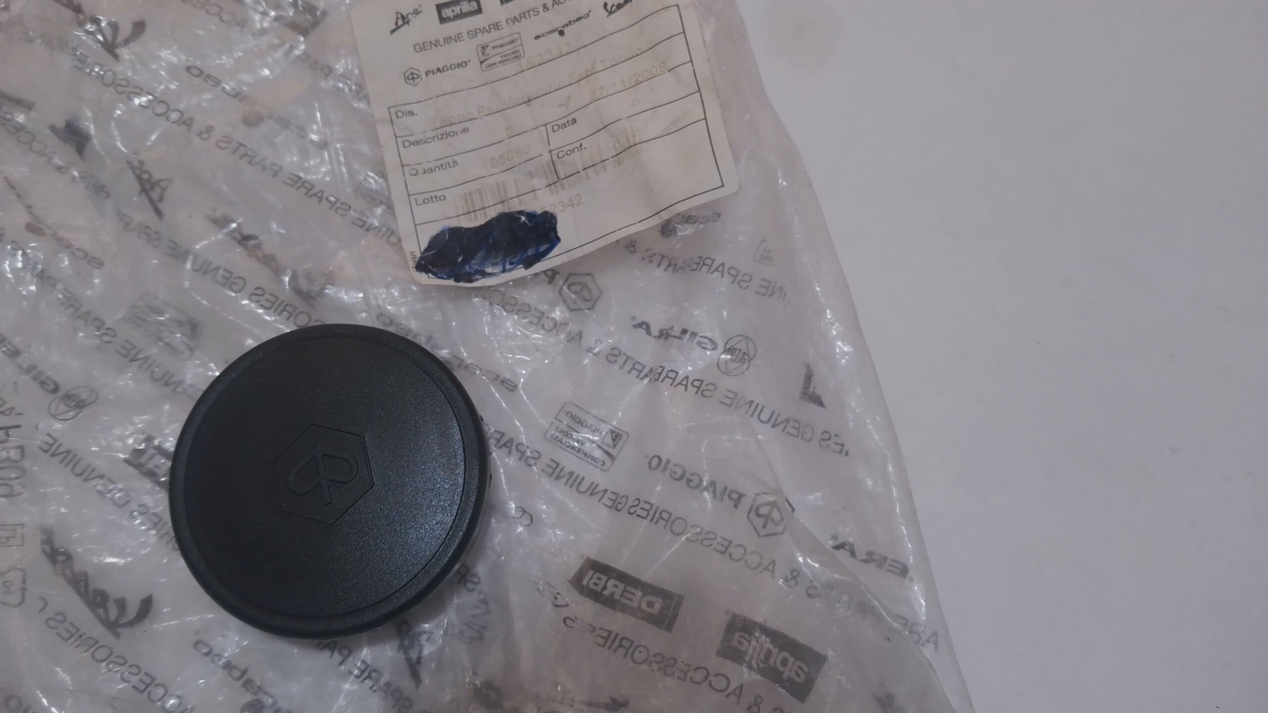 TAPPO CONTACHILOMETRI MANUBRIO VESPA 50 PIAGGIO 152342